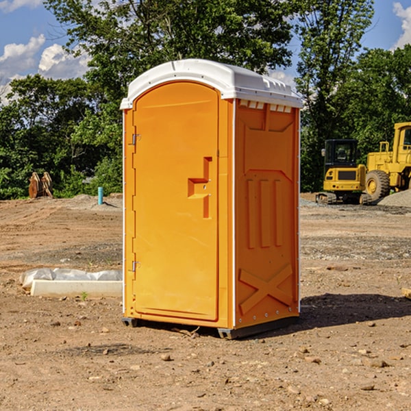 how often are the portable restrooms cleaned and serviced during a rental period in Sand Lake WI